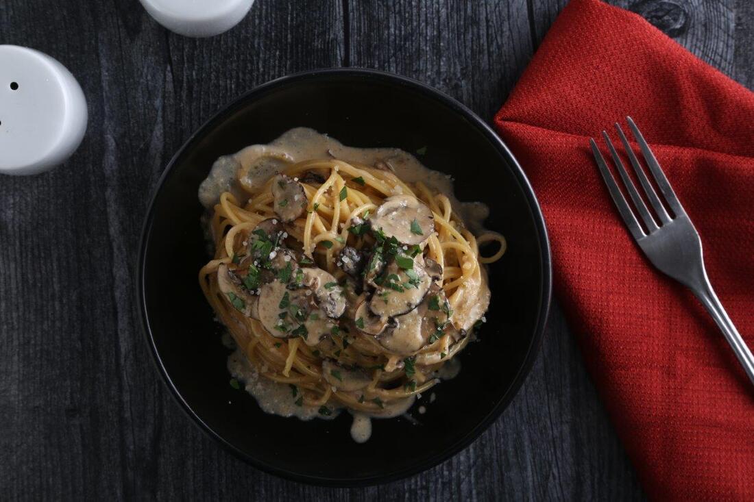 Protein+™ spaghetti with cremini mushrooms, parmigiano, and parsley